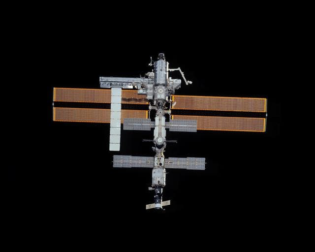 NASA image: Zenith views of the ISS taken during STS-113 approach for docking