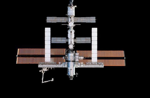 NASA image: ISS during approach of the STS-115 Space Shuttle Atlantis