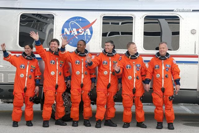 NASA image: STS-133 crew walkout from O&C