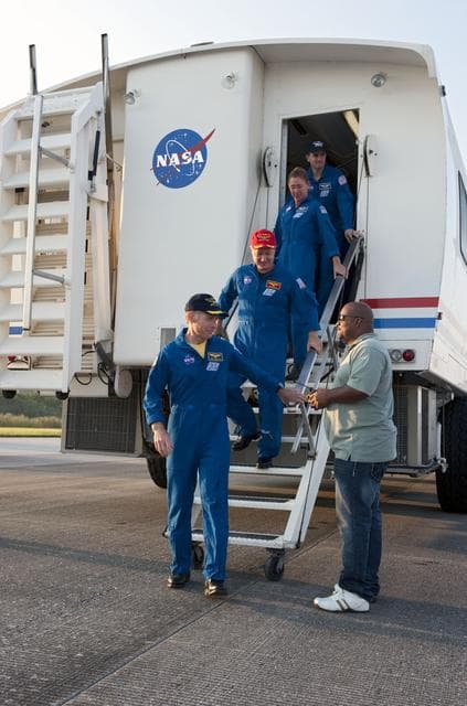 NASA image: STS-135 Crewmembers after the Final Landing of Atlantis