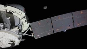 NASA image: Flight Day 14: Orion's Solar Array Splits Earth and Moon